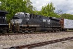 NS 8106 trails on a westbound freight